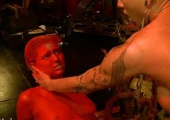 Babe colored in red screwed by tranny