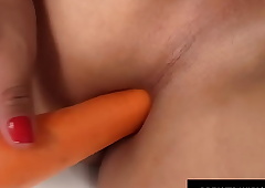 Tgirl Upon a Unmixed Ass Pamela Lenvisk Shoves a Carrot Inside It